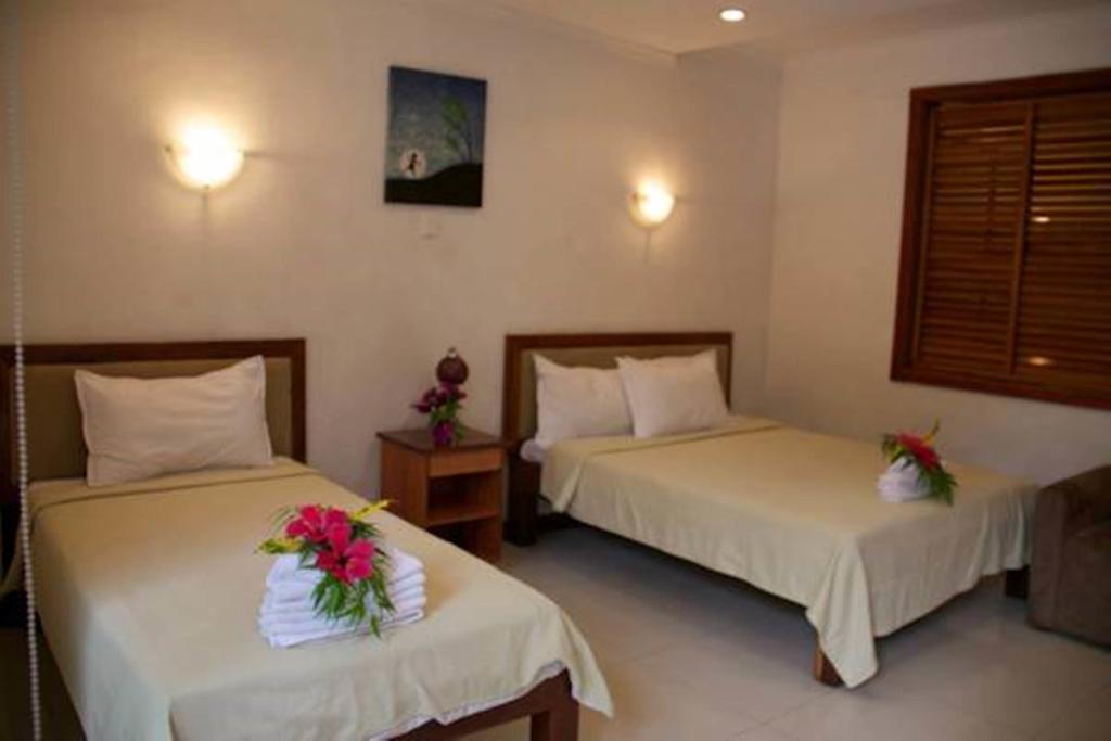 Hideaway Hotel Πορτ Μόρεσμπι Δωμάτιο φωτογραφία